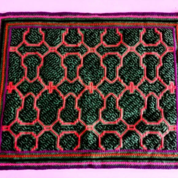 Hand embroidered shipibo altar design multicolored patterns Amazon jungle
